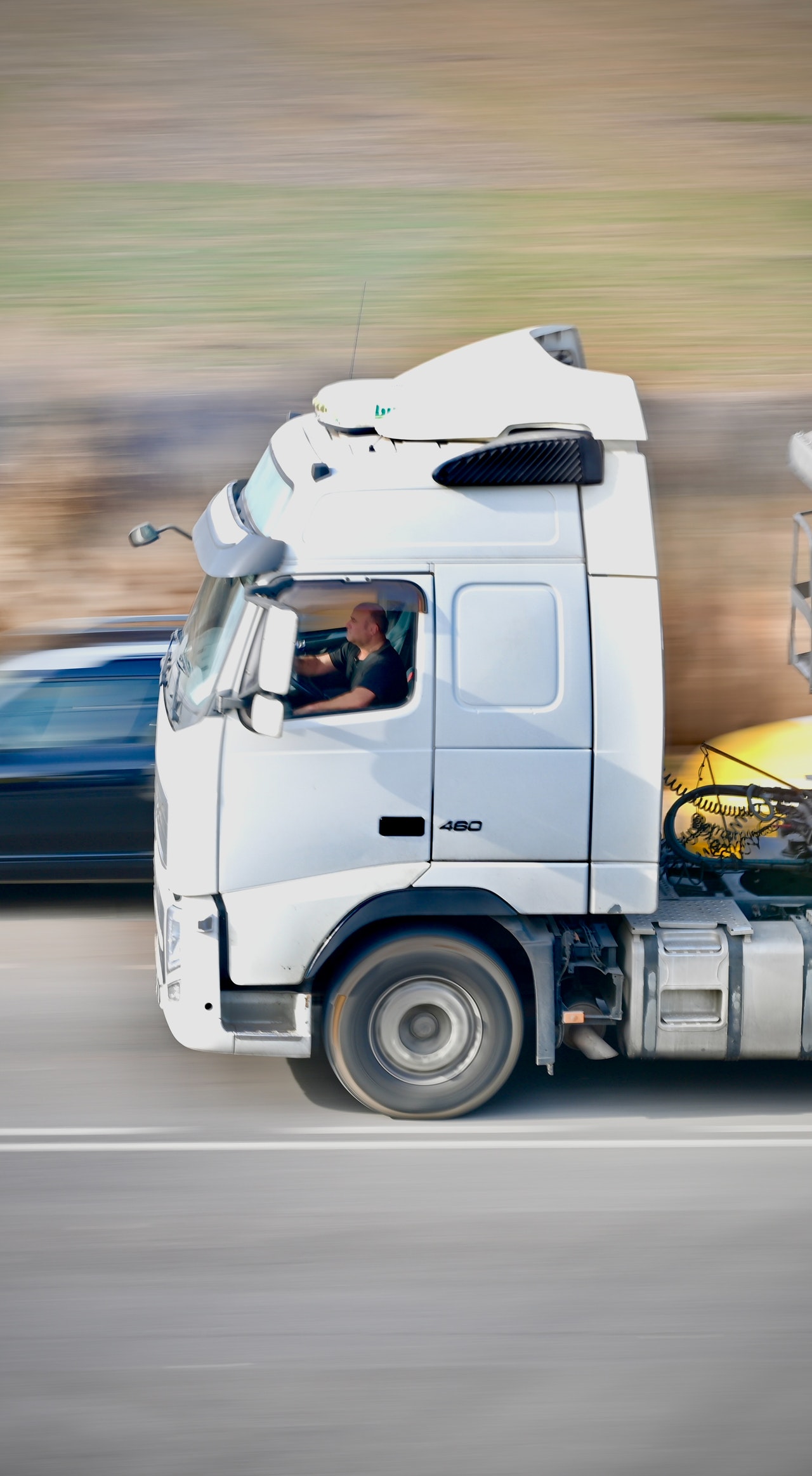 Semi Truck on the road with Driver